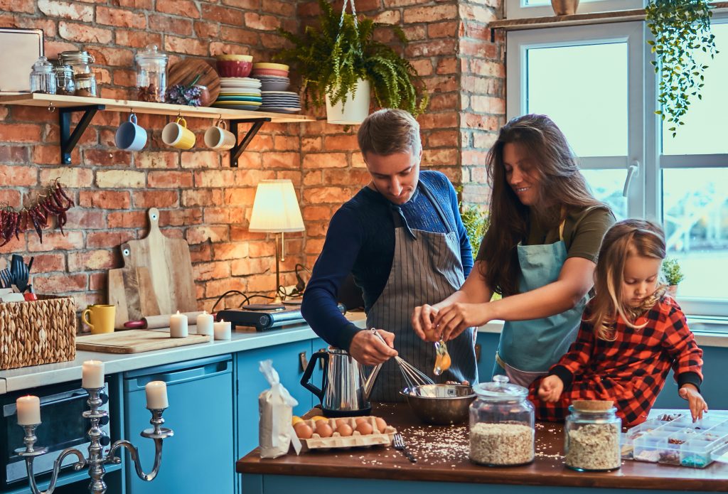 Kitchen appliances running during holiday meal preparation